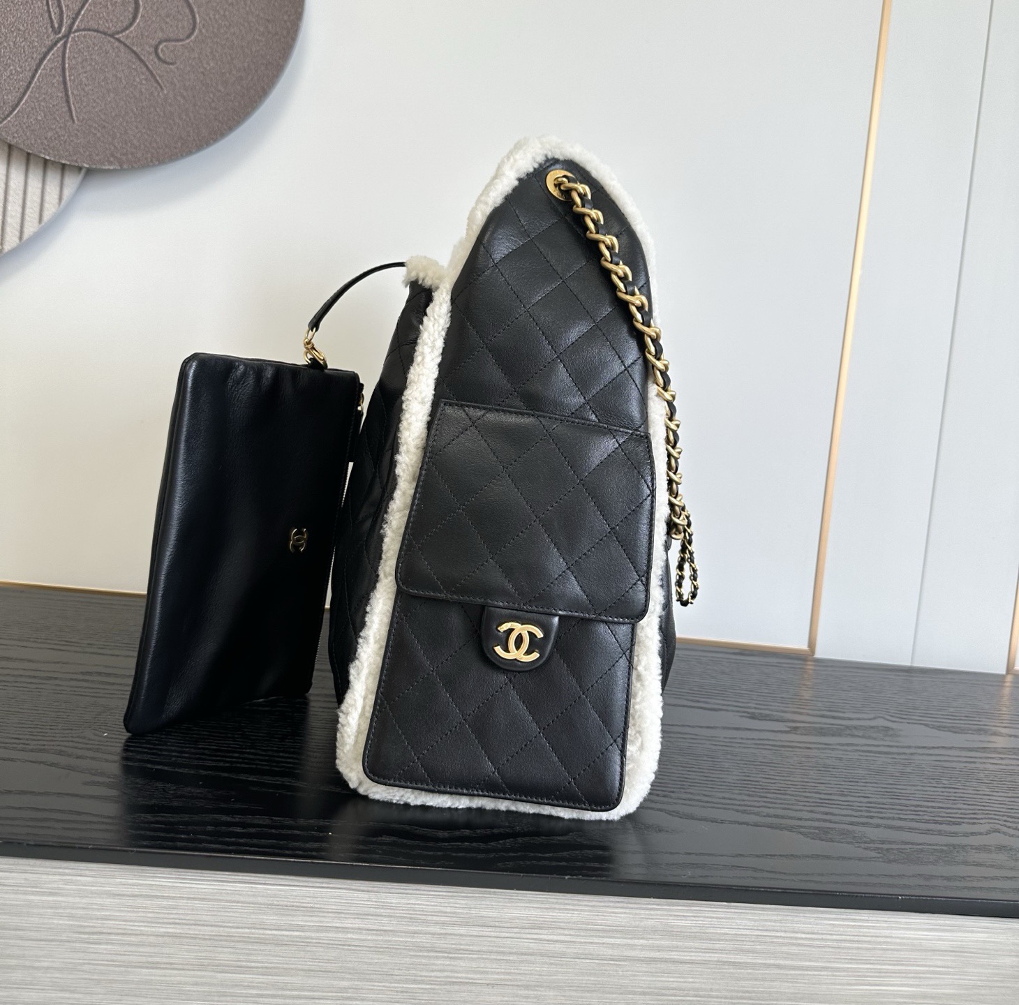 Chanel Large in Black and Cream side profile with cream trim