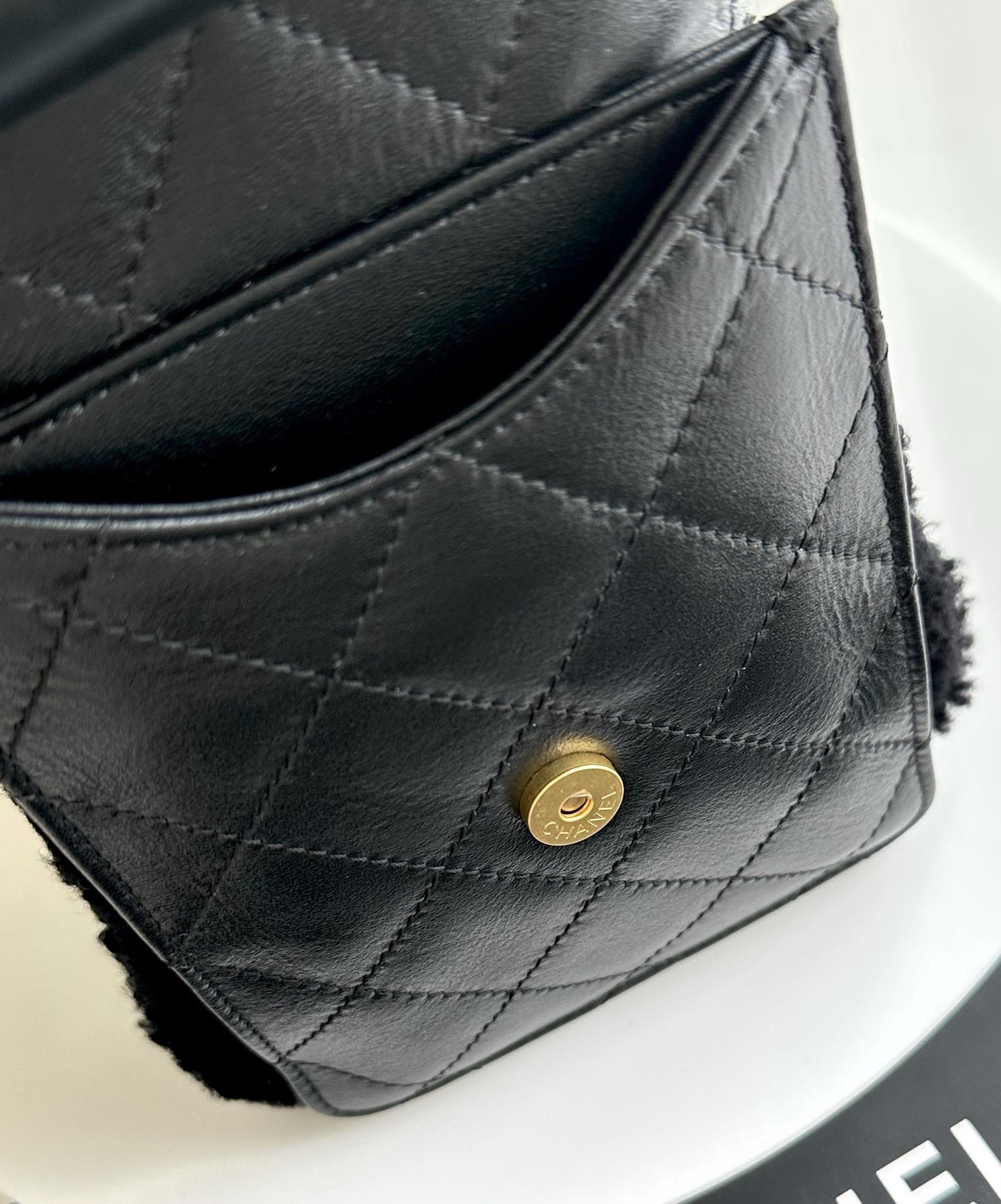 Chanel Small in Black rear pocket detail