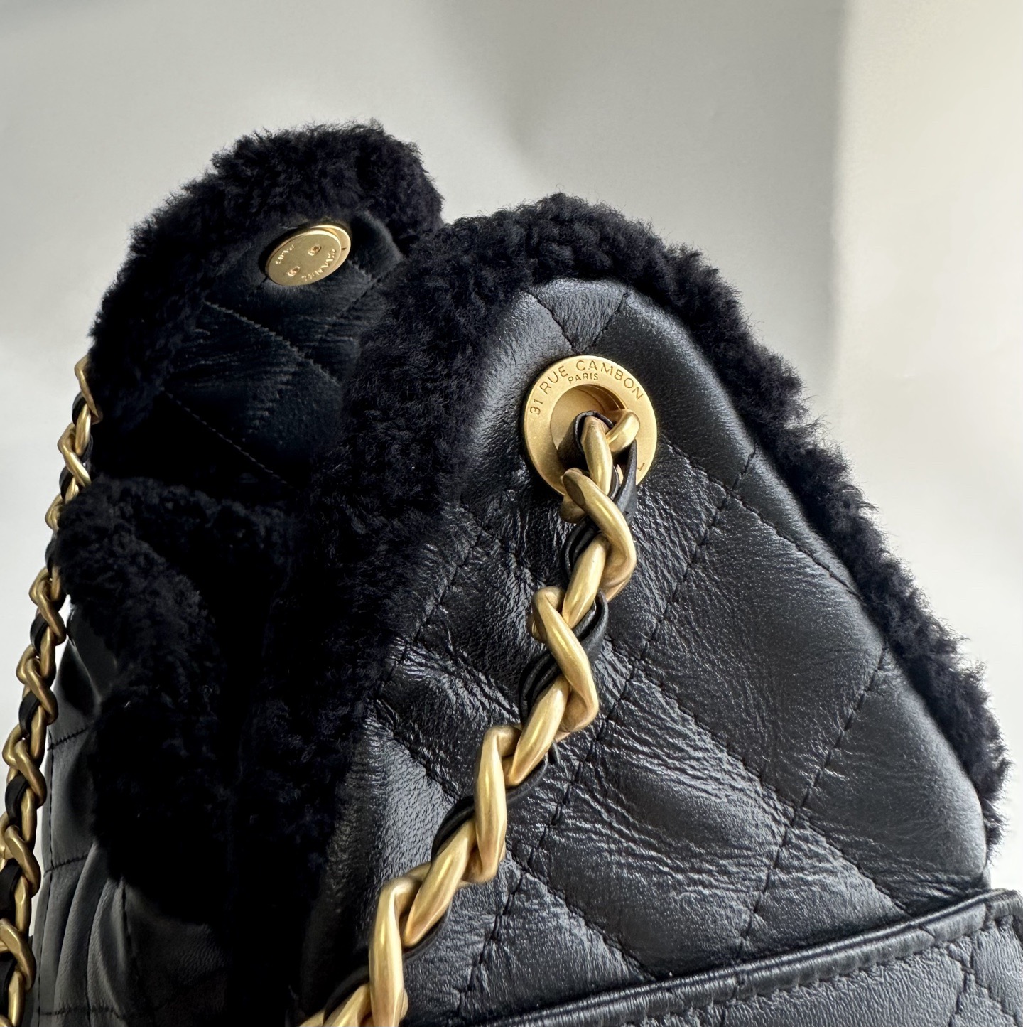 Chanel Small in Black lambswool trim and chain detail